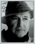 Gene Kelly signed black and white photo. Dedicated. Measures 8