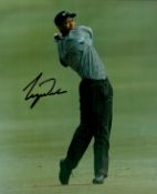 Tiger Woods signed 10x8 inch colour photo. Good condition. All autographs come with a Certificate of