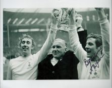 Alan Mullery signed 8x10 inch black and white photo holding the League cup. Good condition Est.