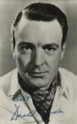 Donald Sinden signed 6x4 inch black and white vintage photo. Good condition Est.