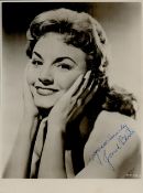 Janet Blair signed 8x6 inch vintage black and white photo with original 1958 mailing envelope.