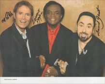 Cliff Richard ,Lamont Dozier and David Guest signed 10x8 inch colour photo.
