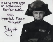 Star Wars 8x10 BandW photo signed by Ty Hurley who has added 'Imperial Fleet Trooper' as well as the
