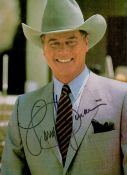 Larry Hagman (1931-2012), a signed 9x7 inch magazine photo. Best remembered for playing oil baron J.