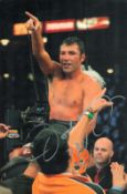 Oscar De la Hoya signed 12x8inch colour photo. Good condition Est.