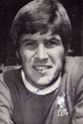 Emlyn Hughes (1947-2004), a signed and dedicated 6x4 photo, dated Oct 1974 to back. A footballer who
