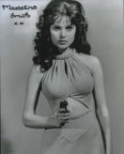 Madeline Smith signed 10x8inch black and white photo. Good condition. All autographs come with a