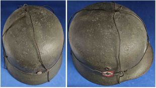 Original WW2 German Military helmet with Nazi swastika on the side. Good condition. All autographs
