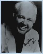 Mickey Rooney signed 10x8 inch black and white photo. Good condition. All autographs come with a