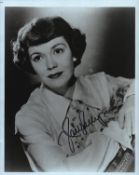 Jane Wyman signed 10x8 inch black and white photo. Good condition. All autographs come with a