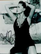 Maria Grazia Cucinotta signed 10x8inch black and white James Bond photo. Good condition. All