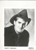 Marty Brown signed 10x8inch black and white promo photo. Dedicated. Music autograph. Good condition.