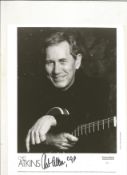 Chet Atkins signed 10x8inch black and white promo photo. Music autograph. Good condition. All