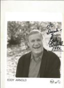 Eddy Arnold signed 10x8inch black and white promo photo. Dedicated. Music autograph. Good condition.