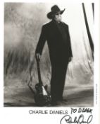 Charlie Daniels signed 10x8inch black and white promo photo. Dedicated. Music autograph. Good