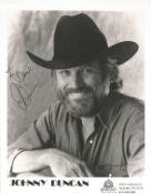 Johnny Duncan signed 10x8inch black and white promo photo. Dedicated. Music autograph. Good
