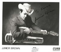 Junior Brown signed 10x8inch black and white promo photo. Dedicated. Music autograph. Good