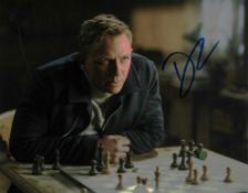 Daniel Craig signed 10x8inch colour photo. Good condition. All autographs come with a Certificate of