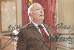 Julian Fellowes signed 6x4 inch colour photo. Good condition. All autographs come with a Certificate