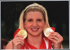 Rebecca Adlington signed 12x8 inch colour photo. Good condition. All autographs come with a