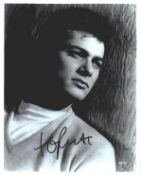 Tony Curtis signed 10x8inch black and white photo. Good condition. All autographs come with a