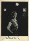 Dame Judie Dench signed black and white photo-post card. Good condition Est.