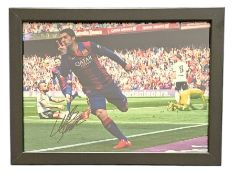 Football Luis Suarez signed 13x10inch overall framed colour photo pictured in action for