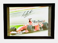 Formula One, Michael Schumacher signed 13x10inch overall framed colour photo pictured driving for