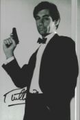 Timothy Dalton signed 12x8inch James Bond black and white photo. Good