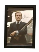 Michael Caine signed 13x10inch overall frame and mounted 