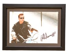 Arnold Schwarzenegger signed 13x10inch overall framed and mounted Terminator colour photo. Good