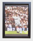 Football, Cristiano Ronaldo signed 13x10inch overall framed colour photo pictured in action for Real