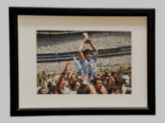Football, Diego Maradona signed 17x13inch framed and mounted colour photo pictured celebrating