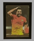 Football, Xavi signed 13x10inch overall framed colour photo pictured in action for Barcelona. Good