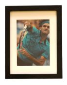 Tennis, Roger Federer signed 11x8inch overall framed and mounted colour photo. Good condition. All