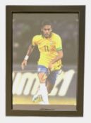 Football, Neymar signed 13x10inch framed colour photo pictured in action for Brazil. Good condition.