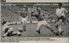 Terry Paine MBE signed black and white magazine photo. Terry Paine scores the first in England's 2-1
