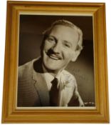 Leslie Phillips signed black and white photo mounted and framed with glass 12.5x10 inch in size.