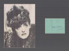 Bette Davis signature piece with signed album page and black and white unsigned photo mounted