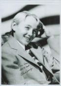 Claude Jarman Jr signed 12x8 inch black and white photo. Good condition Est.