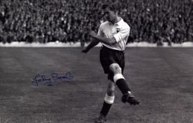 Johnny Brooks signed 12x8 inch black and white photo pictured in action for Tottenham Hotspur.