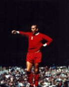 Ian St John signed 10x8 inch colour photo pictured while playing for Liverpool. Good condition Est.