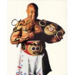 Boxing George Foreman signed 10x8 inch colour photo. Good condition Est.