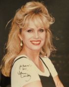 Joanna Lumley signed 20x14inch approx colour photo. Good condition. All autographs come with a