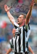 Autographed KEVIN NOLAN 12 x 8 photo : Col, depicting Newcastle United's KEVIN NOLAN celebrating