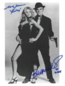 Britt Ekland and Mark Lawrence signed 10x8inch James Bond colour photo. Good condition. All