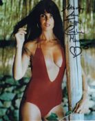 007 Bond movie star Caroline Munro signed sexy red swimsuit colour 8x10 photo. Good condition. All