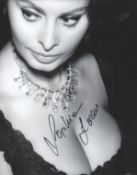 Sophia Loren signed 10x8inch black and white photo. Good condition. All autographs come with a
