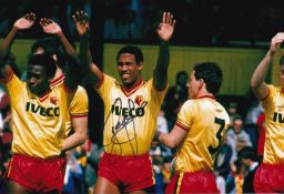 Autographed JOHN BARNES 12 x 8 photo : Col, depicting Watford's JOHN BARNES applauding the crowd