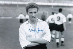 Autographed CLIFF JONES 12 x 8 photo : B/W, depicting Swansea winger CLIFF JONES posing for